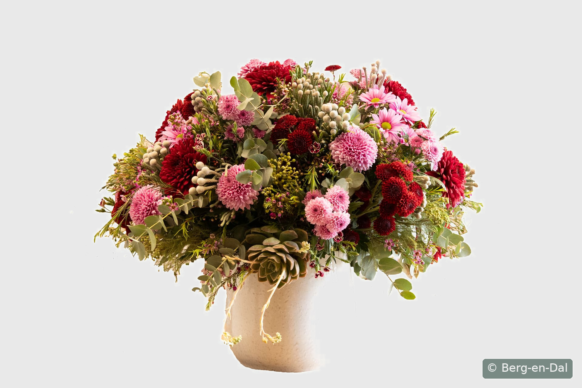 Freshly cut chrysanthemums bundled in galvanized farm buckets